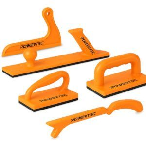 Five bright orange POWERTEC push blocks and push sticks arranged on a white background, featuring ergonomic handles and non-slip bases for safer table saw and jointer cuts.